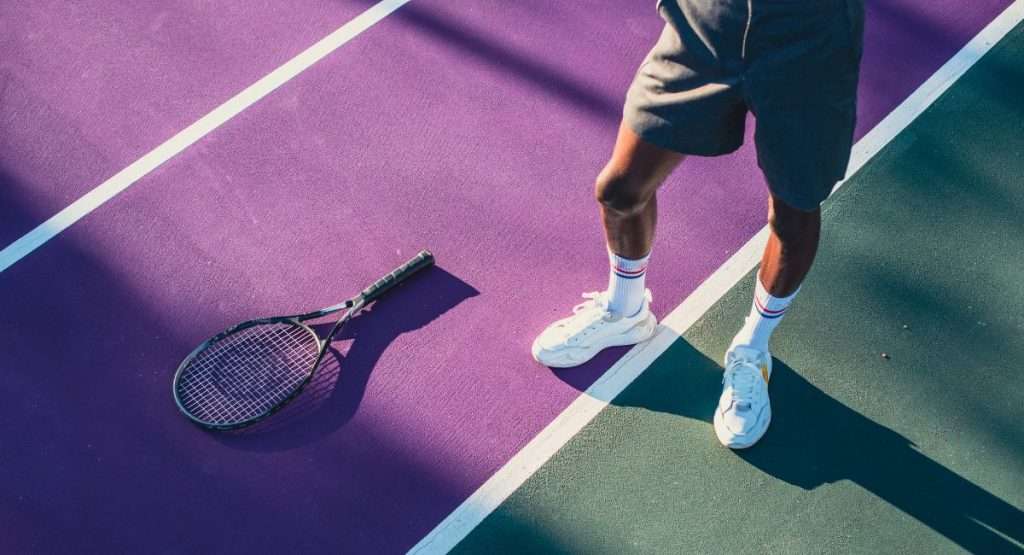 tennis rackets on ground